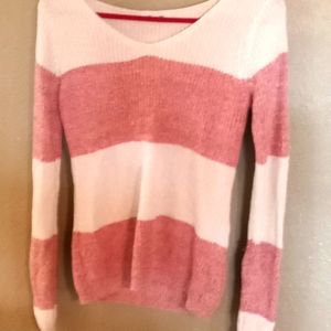 11 shirts, and 2 pair of pants, and 1 dress.